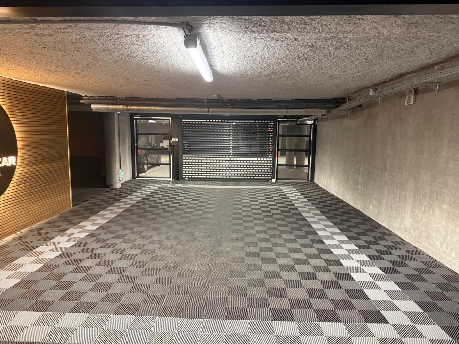 Vue de l'entrée du parking couvert et sécurisé GenPark à Archamps.